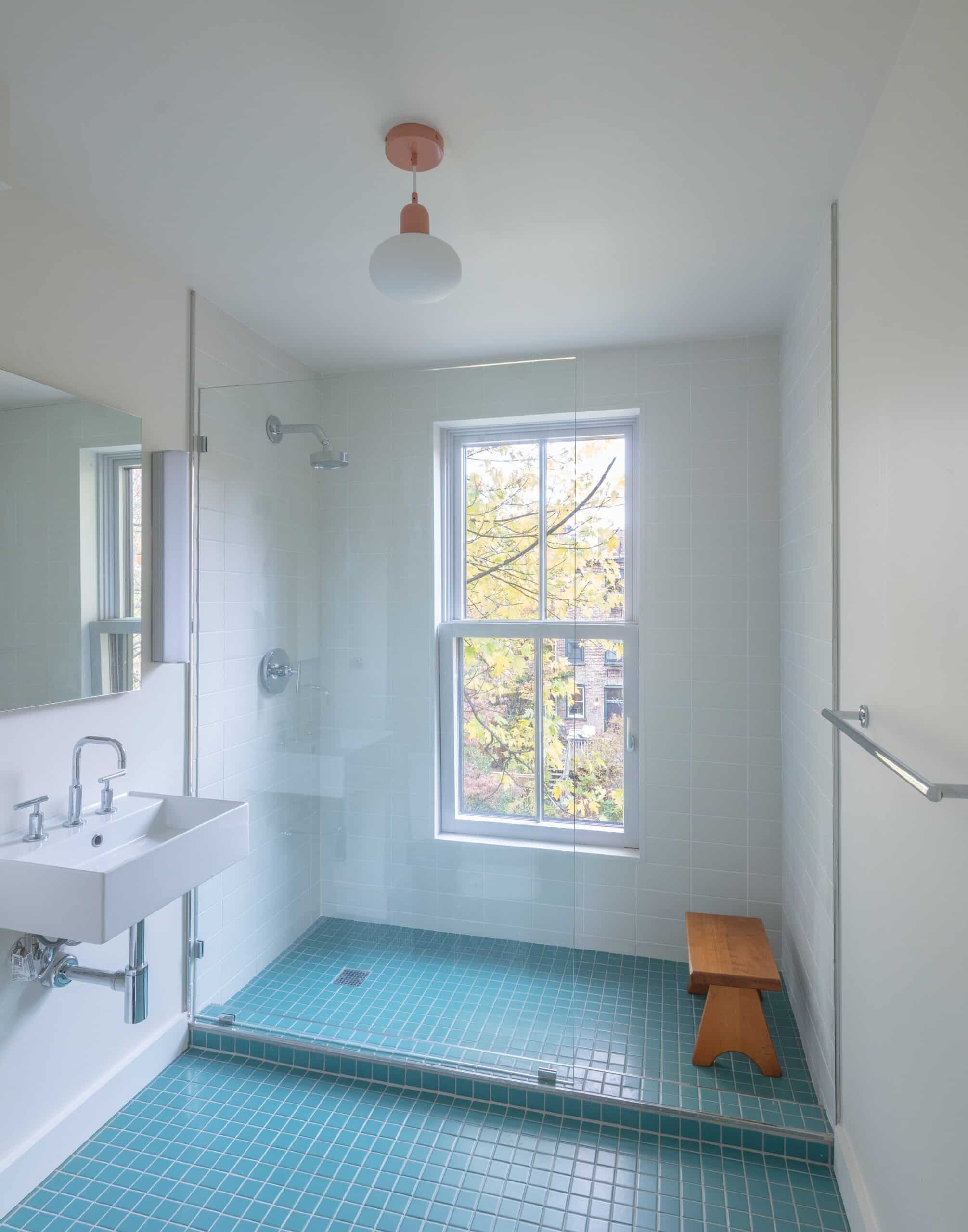 BATH WITH BLUE TILE FLOOR