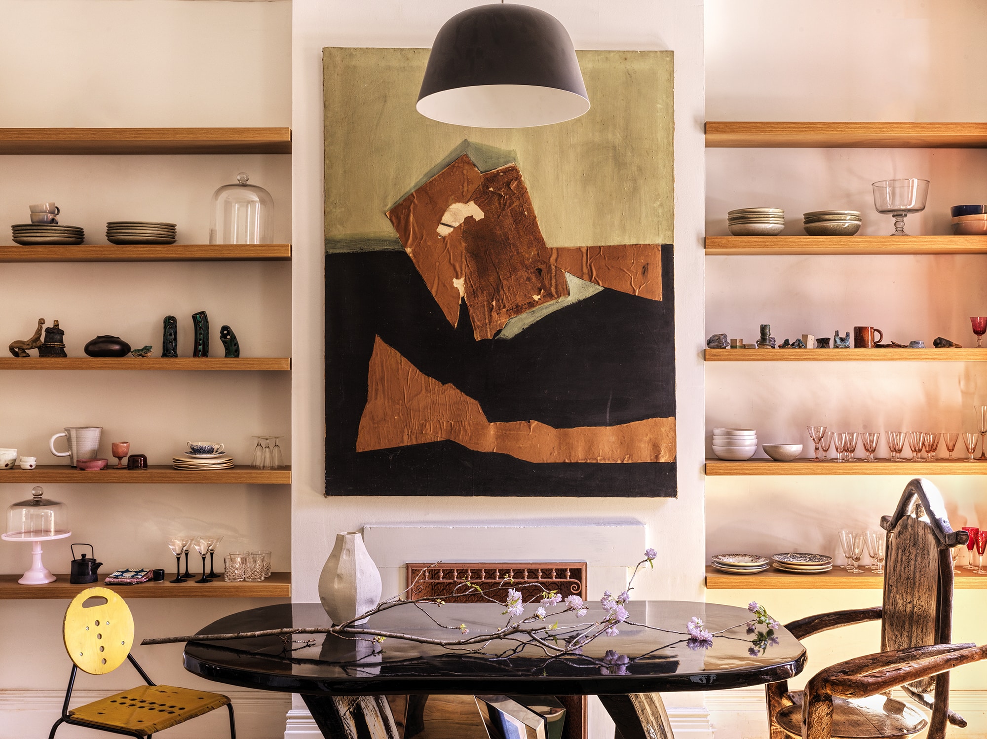 BOOKSHELVES WITH ABSTRACT PAINTING