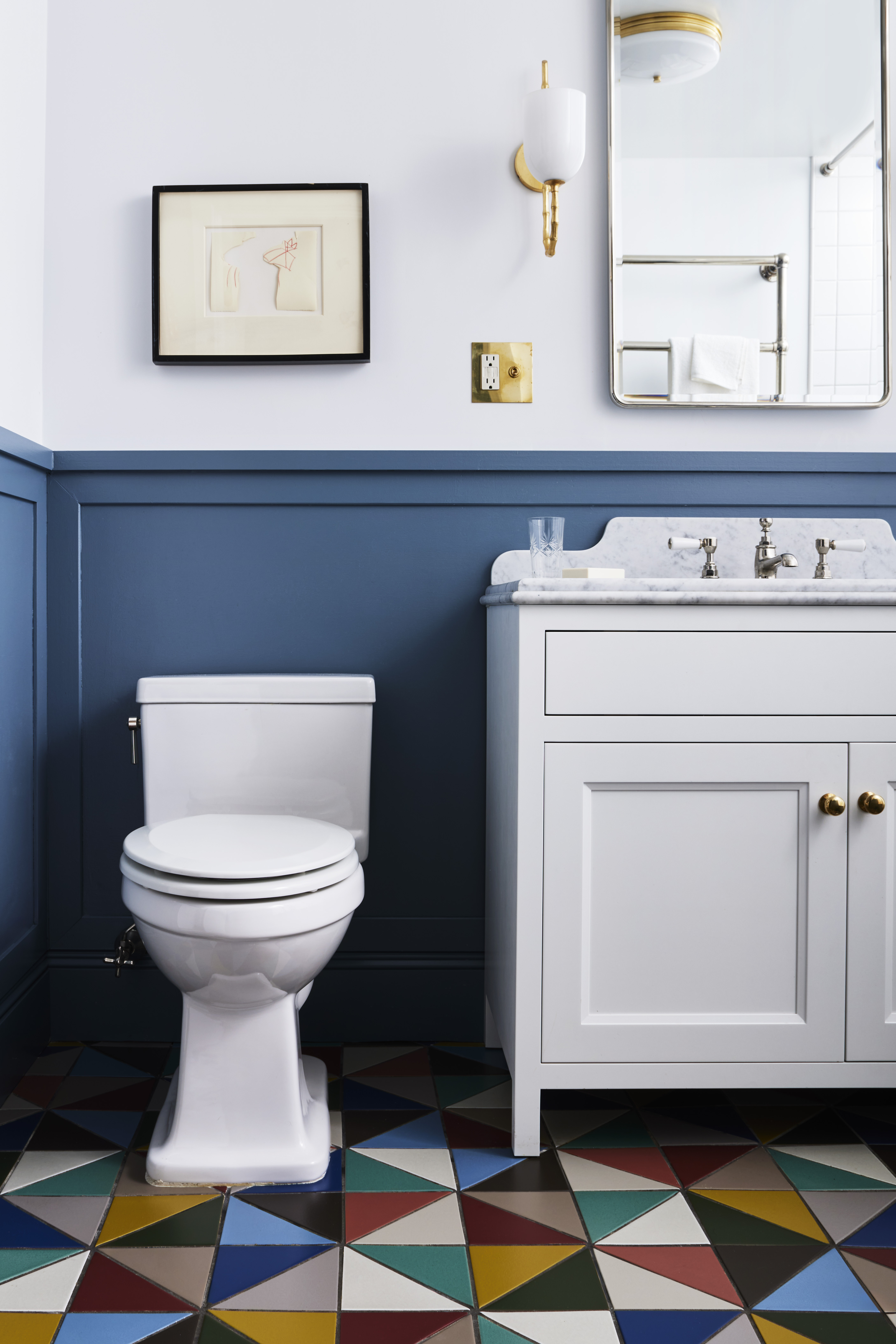 PRIMARY BATH SINK AND TOILET BLUE WAINSCOT
