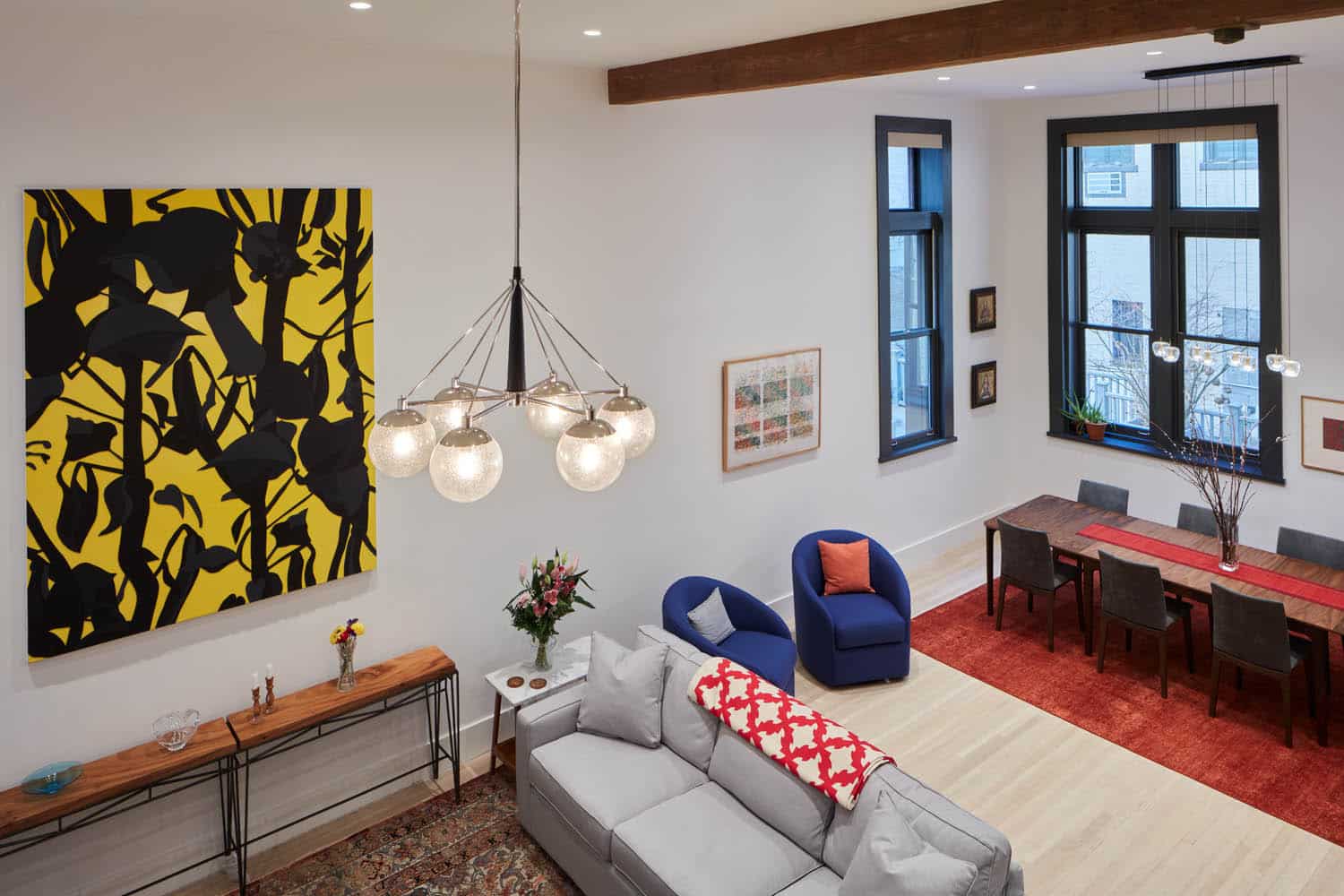 LIVING DINING - overhead view of of living and dining room with a large wood beam