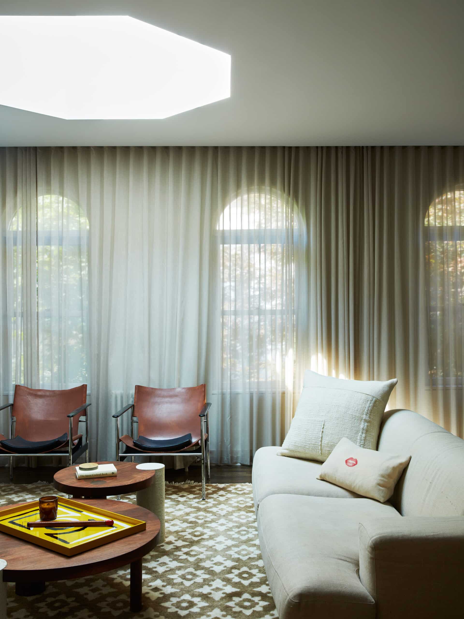 LIVING ROOM WITH DRAPES